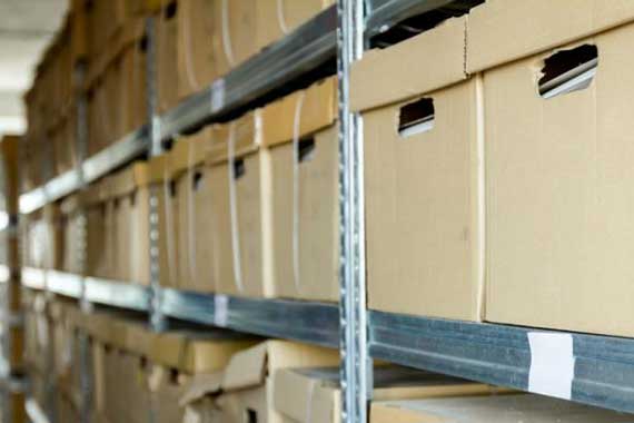 Boxes of business records in storage in Saranac Lake
